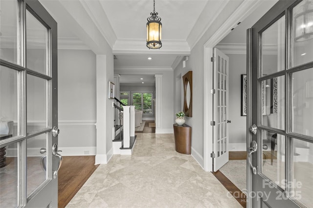 9831 Sedgefield Dr, Waxhaw, NC 28173 - foyer entrance with french doors, baseboards, stairs, crown molding, and recessed lighting