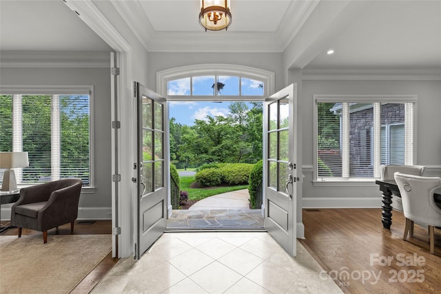9831 Sedgefield Dr, Waxhaw, NC 28173 - foyer featuring baseboards, crown molding, light tile patterned floors, and french doors