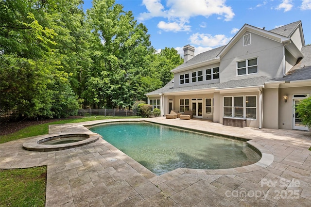 9831 Sedgefield Dr, Waxhaw, NC 28173 - view of swimming pool featuring a patio area and a pool with connected hot tub