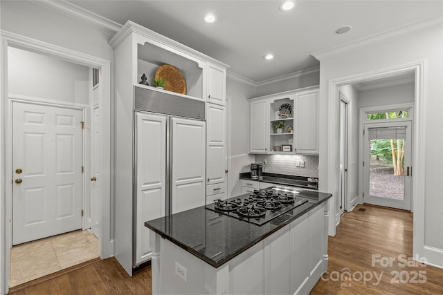 9831 Sedgefield Dr, Waxhaw, NC 28173 - kitchen featuring open shelves, black gas stovetop, white cabinetry, crown molding, and dark wood-style floors