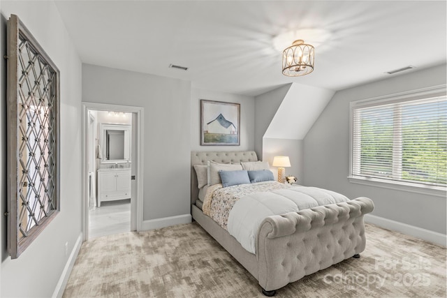 9831 Sedgefield Dr, Waxhaw, NC 28173 - bedroom featuring baseboards, a chandelier, light colored carpet, and ensuite bath