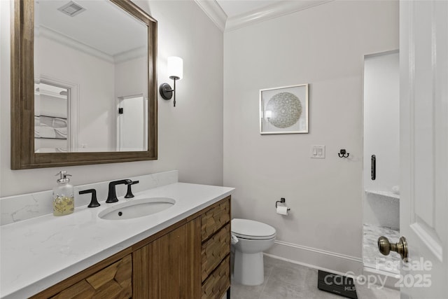 9831 Sedgefield Dr, Waxhaw, NC 28173 - bathroom with crown molding, baseboards, vanity, toilet, and tile patterned floors