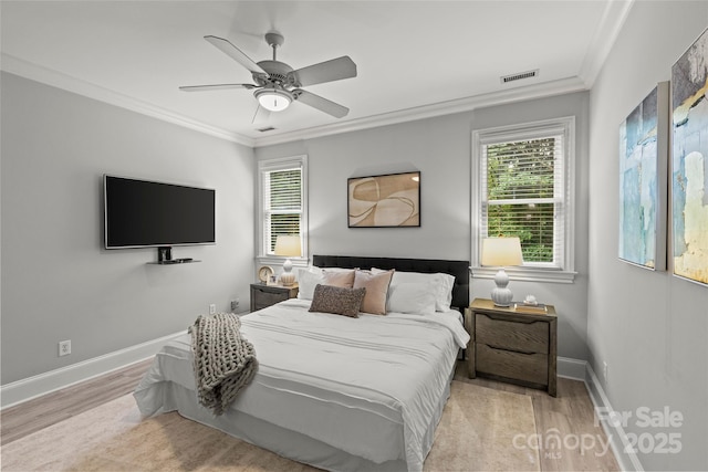 9831 Sedgefield Dr, Waxhaw, NC 28173 - bedroom with ornamental molding, light wood-style floors, multiple windows, and baseboards