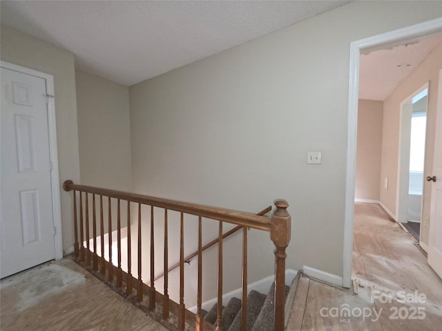 hallway with an upstairs landing