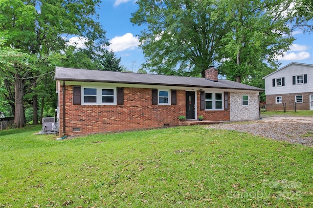 2401 Woodleaf Dr, Gastonia, NC 28052 - view of front of house featuring brick siding, a chimney, and crawl space
