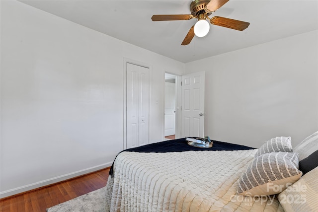 2401 Woodleaf Dr, Gastonia, NC 28052 - bedroom with wood finished floors, baseboards, a closet, and ceiling fan