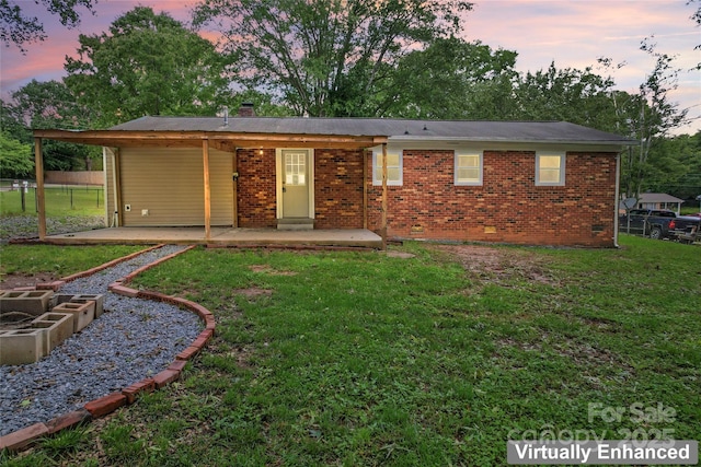 2401 Woodleaf Dr, Gastonia, NC 28052 - view of front of property with a chimney, brick siding, a patio, and crawl space
