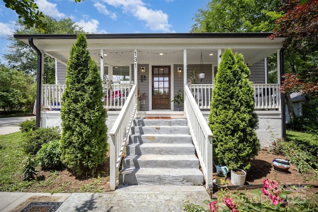 131 Swink St SW, Concord, NC 28027 - view of front facade featuring a porch