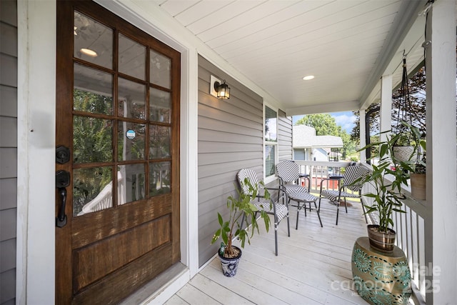 131 Swink St SW, Concord, NC 28027 - wooden deck featuring covered porch