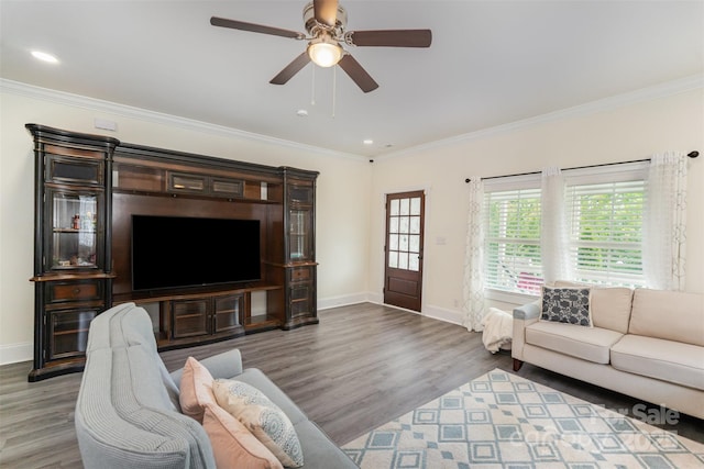 131 Swink St SW, Concord, NC 28027 - living room with baseboards, wood finished floors, crown molding, a ceiling fan, and recessed lighting