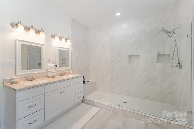131 Swink St SW, Concord, NC 28027 - bathroom with a marble finish shower and double vanity