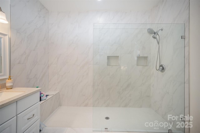 131 Swink St SW, Concord, NC 28027 - full bathroom featuring a marble finish shower and vanity