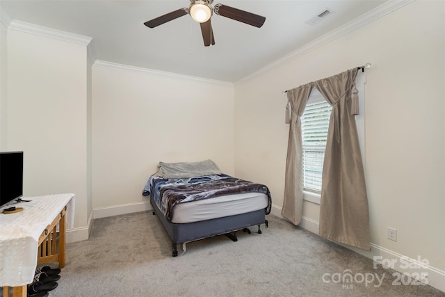 131 Swink St SW, Concord, NC 28027 - bedroom with crown molding, light colored carpet, baseboards, and a ceiling fan