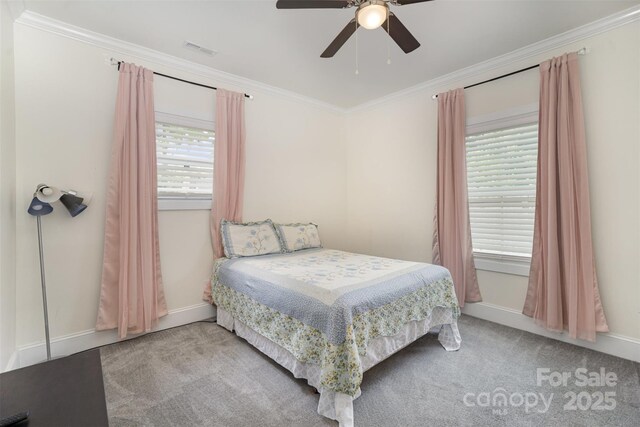 131 Swink St SW, Concord, NC 28027 - bedroom featuring ornamental molding, carpet flooring, baseboards, and a ceiling fan