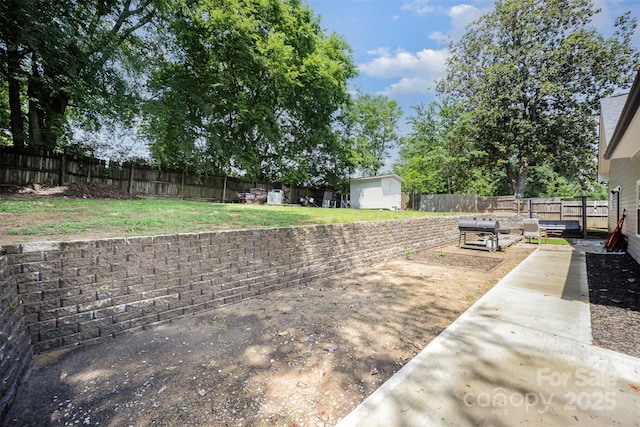 131 Swink St SW, Concord, NC 28027 - view of yard featuring a patio, an outdoor structure, and a shed