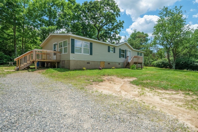 3823 Silver Creek Ter, Morganton, NC 28655 - manufactured / mobile home featuring stairway, crawl space, a deck, and a front yard