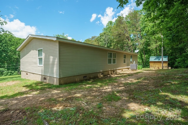 3823 Silver Creek Ter, Morganton, NC 28655 - view of property exterior featuring crawl space and central air condition unit