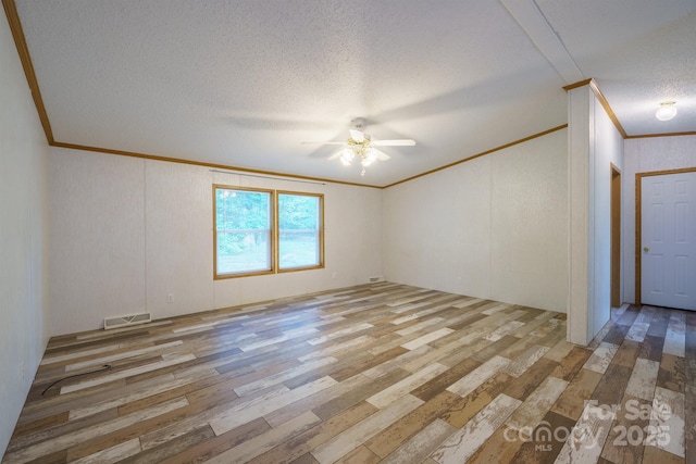 3823 Silver Creek Ter, Morganton, NC 28655 - empty room with ornamental molding, a ceiling fan, light wood finished floors, and a textured ceiling