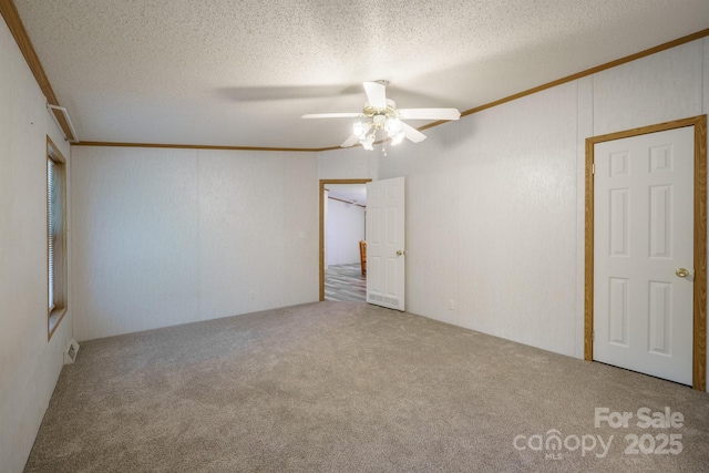 3823 Silver Creek Ter, Morganton, NC 28655 - carpeted spare room with crown molding, ceiling fan, and a textured ceiling