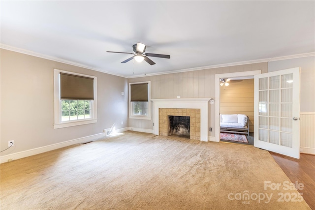 80 Pine St, Badin, NC 28009 - unfurnished living room with ceiling fan, ornamental molding, a fireplace, and baseboards