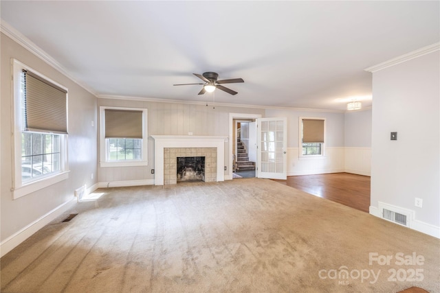 80 Pine St, Badin, NC 28009 - unfurnished living room with a ceiling fan, carpet, crown molding, a fireplace, and baseboards