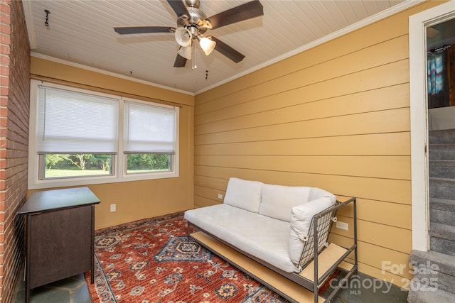 80 Pine St, Badin, NC 28009 - living area with a ceiling fan, crown molding, wood walls, carpet floors, and stairs