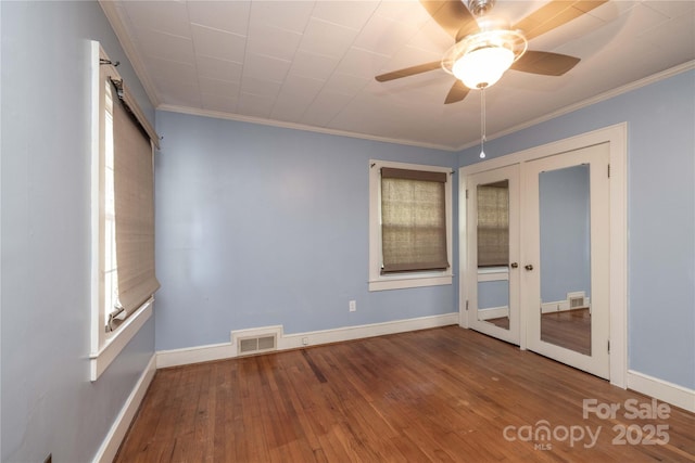 80 Pine St, Badin, NC 28009 - spare room with french doors, hardwood / wood-style flooring, a ceiling fan, baseboards, and crown molding