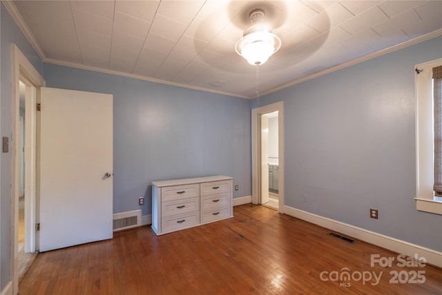 80 Pine St, Badin, NC 28009 - unfurnished bedroom featuring hardwood / wood-style flooring, ornamental molding, and baseboards