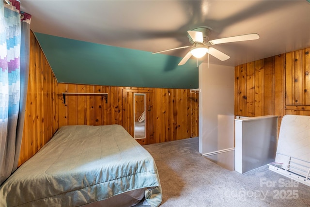 80 Pine St, Badin, NC 28009 - bedroom with wooden walls, carpet flooring, and a ceiling fan