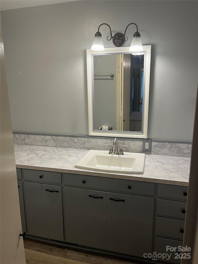80 Pine St, Badin, NC 28009 - bathroom with vanity and wood finished floors