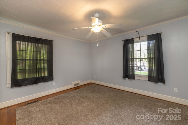 80 Pine St, Badin, NC 28009 - empty room with ornamental molding, ceiling fan, wood finished floors, and baseboards