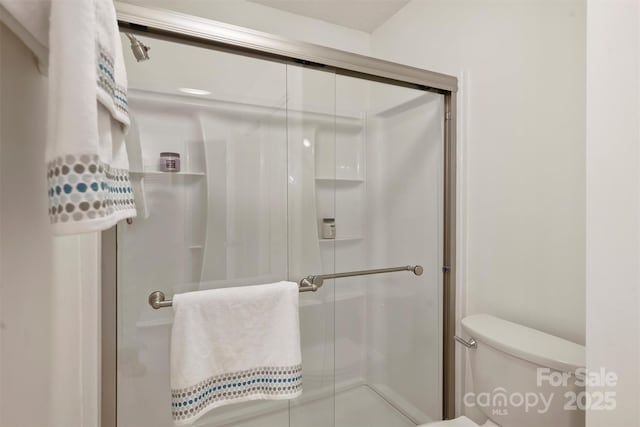 6016 Gray Gate Ln Unit C, Charlotte, NC 28210 - full bathroom with a stall shower and toilet