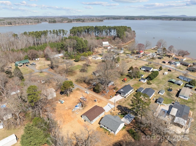 aerial view of property's location featuring a nearby body of water