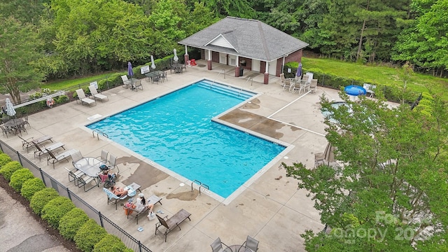 309 Palm Cove Way, York, SC 29745 - community pool featuring a patio area and an outdoor structure