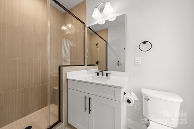 4011 Tundra Rd, Charlotte, NC 28203 - bathroom with a shower stall, vanity, and toilet