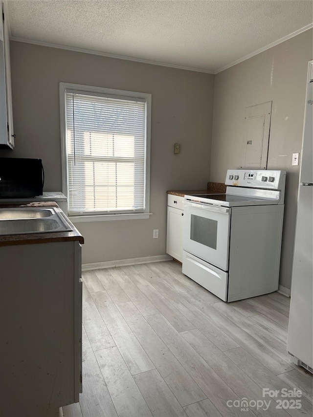 kitchen featuring white electric range, ornamental molding, a textured ceiling, light wood-style flooring, and white cabinets