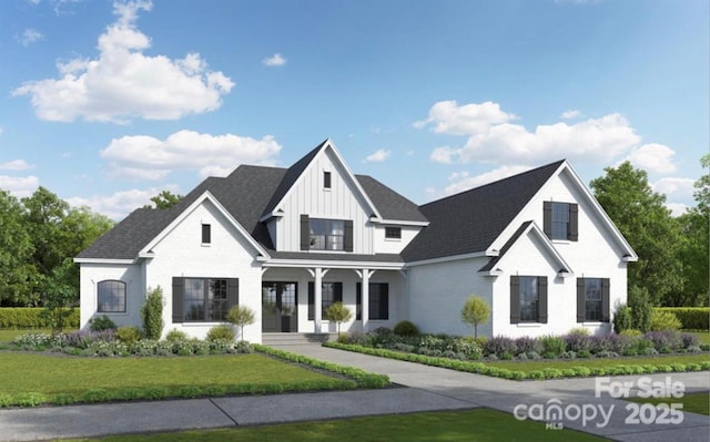 04 Lurecliff Pl, Fort Mill, SC 29708 - modern farmhouse with board and batten siding, a front yard, a porch, and brick siding