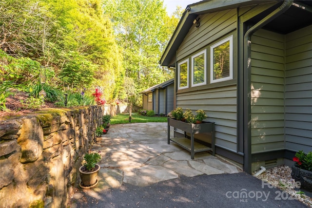 view of home's exterior featuring a patio area