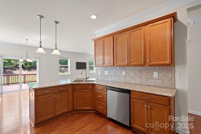 9230 Loch Glen Way, Charlotte, NC 28278 - kitchen featuring stainless steel dishwasher, a sink, a peninsula, brown cabinetry, and ornamental molding