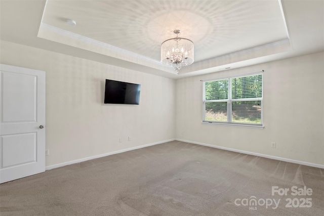 9230 Loch Glen Way, Charlotte, NC 28278 - carpeted empty room featuring a raised ceiling, baseboards, crown molding, a chandelier, and a smoke detector