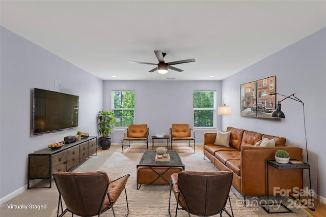 9230 Loch Glen Way, Charlotte, NC 28278 - living room featuring ceiling fan and baseboards