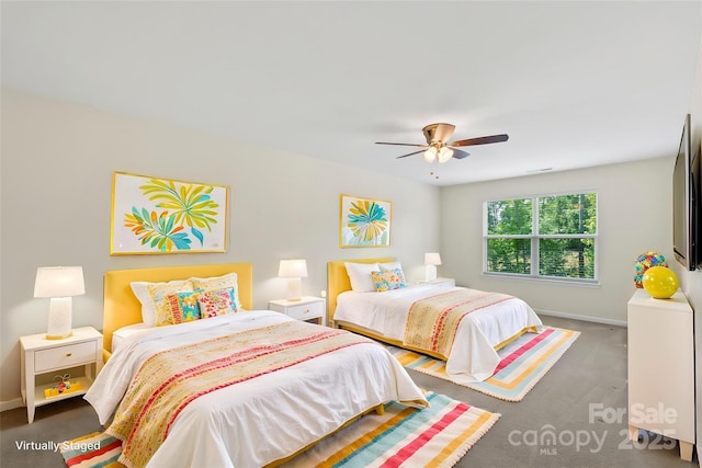9230 Loch Glen Way, Charlotte, NC 28278 - carpeted bedroom with baseboards and ceiling fan