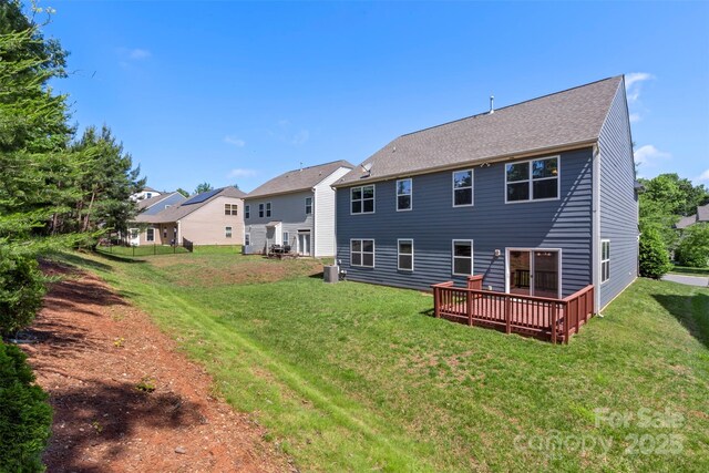 9230 Loch Glen Way, Charlotte, NC 28278 - rear view of house featuring a lawn and a deck