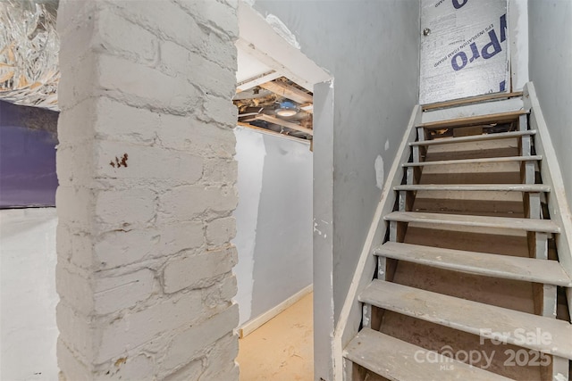 417 S Broad St, Gastonia, NC 28052 - staircase with concrete floors