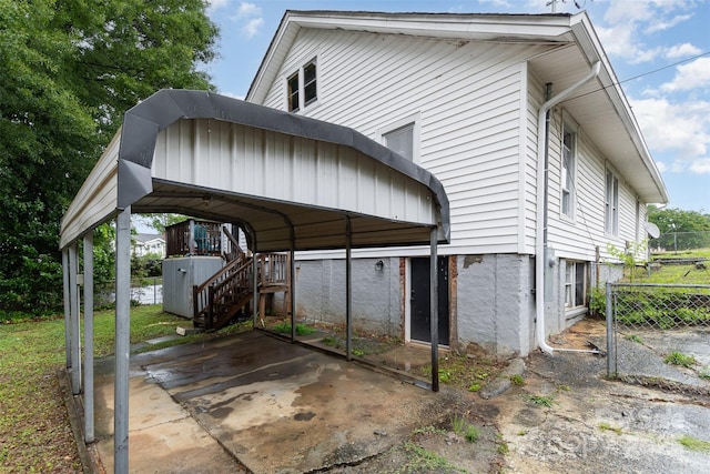 417 S Broad St, Gastonia, NC 28052 - view of vehicle parking featuring fence and a carport