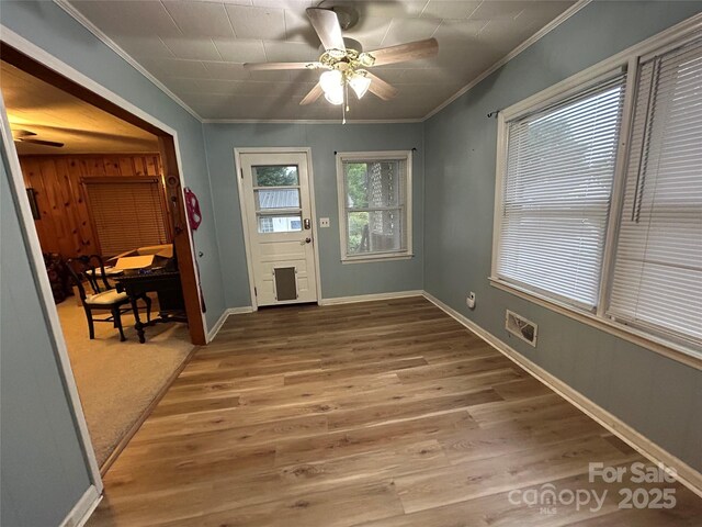 2009 Hickory Grove Rd, Gastonia, NC 28056 - entryway featuring ornamental molding, wood finished floors, a ceiling fan, and baseboards