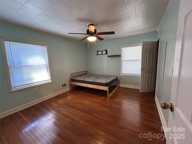 2009 Hickory Grove Rd, Gastonia, NC 28056 - unfurnished bedroom with crown molding, wood finished floors, ceiling fan, and baseboards