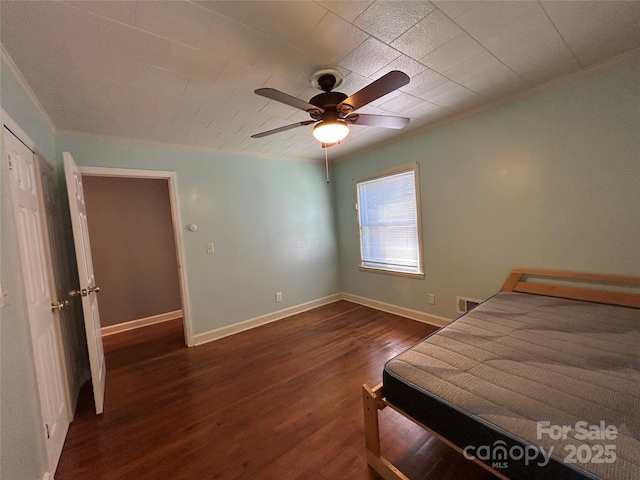 2009 Hickory Grove Rd, Gastonia, NC 28056 - bedroom with ornamental molding, dark wood-style floors, baseboards, and a ceiling fan
