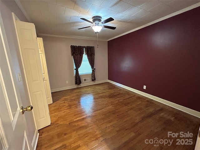 2009 Hickory Grove Rd, Gastonia, NC 28056 - unfurnished room featuring ornamental molding, wood finished floors, a ceiling fan, and baseboards