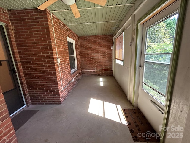 2009 Hickory Grove Rd, Gastonia, NC 28056 - unfurnished sunroom with plenty of natural light and a ceiling fan